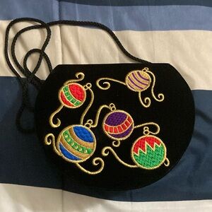 Beautiful like new evening bag with embroidered front